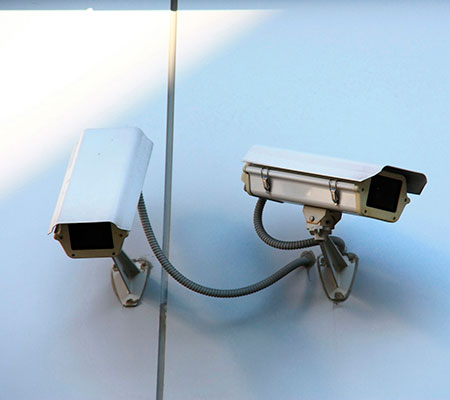 Security system surveillance camera maintenance